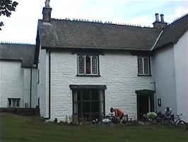 Bike repairs outside Dentdale Youth Hostel